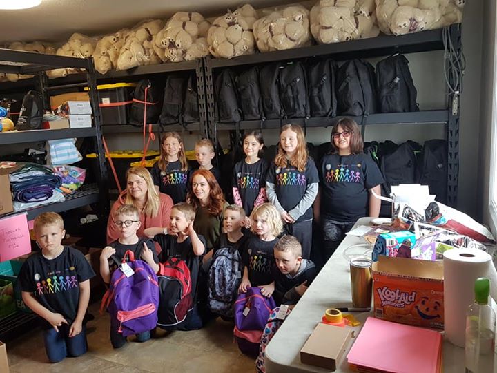 Earlyact having fun today packing Luvpaks for kids in need! 11 kids packed 50…