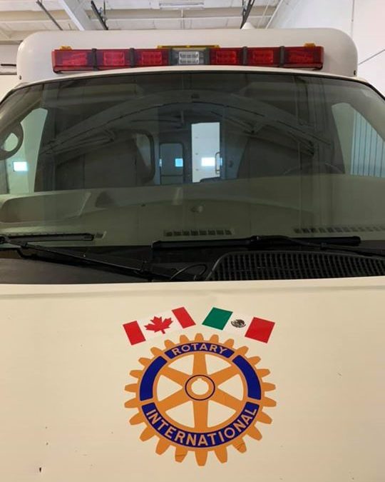 Highway to Mexico project team getting our vehicles’ decals on